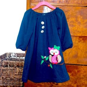Vintage girls dress with owl appliqué and pouf sleeves.